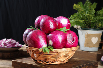 Fresh Red Onions in Wicker Basket - Organic Vegetables for Healthy Cooking