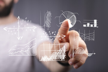 Person interacting with visualized graphs and charts, displaying data analysis, business, statistics, finance. Modern technology and information