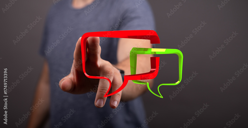 Wall mural man pointing at digital speech bubble interface for online conversation and virtual interaction usin