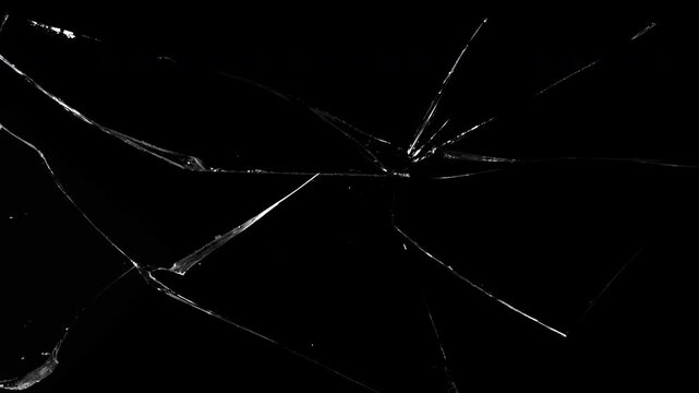 Diagonal Glass Fracture Lines Spreading Across Dark Surface. Realistic animation of diagonal cracks forming in black glass &mdash; great for glitch effects, tech breakdown scenes.