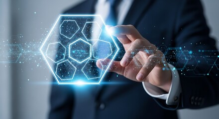 Businessman interacting with futuristic digital hexagon interface and glowing technology data