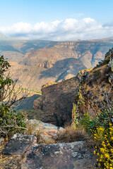 A view down from rocky side into  Blyde River Canyon,  Mpumalanga, South Africa in Springtime