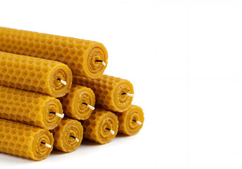 Honeycomb beeswax candles stacked for celebration of Orthodox Christmas  copyspace 