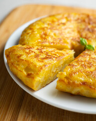Traditional Spanish potato omelet. Step-by-step recipe to learn how to cook.