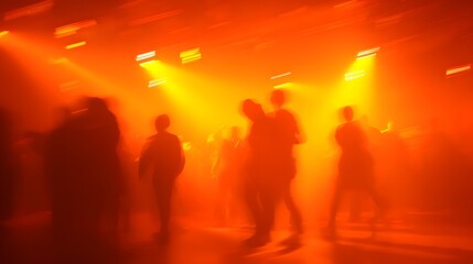 Fototapeta premium Halloween party lounge blurred silhouettes of costumed figures dancing under neon orange strobes