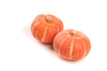 Fresh Orange Pumpkins on White Background - Autumn Harvest Vegetables