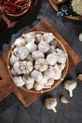 Fresh Garlic Bulbs in Woven Basket - Traditional Asian Cooking Ingredients from Shandong Farmers Market