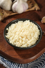 Fresh Shandong Farm Garlic Chopped in Rustic Bowl - Organic Cooking Ingredient