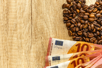 Coffee Market and Rising Prices Concept with Euro Banknotes and Coffee Beans