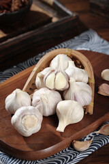 Fresh Shandong Farm Garlic Bulbs in Bamboo Basket on Wooden Cutting Board Kitchen Photography
