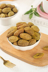 Mediterranean Green and Dried Spiced Olives in Bowls on Wooden Board - Healthy Snack Food