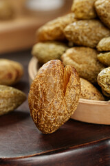 Chaozhou Candied Dried Olives Traditional Chinese Preserved Fruit Snack in Wooden Bowl