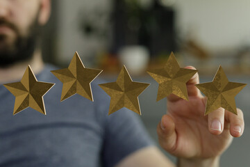 Man pointing at rating stars, representing feedback, review, satisfaction, and quality evaluation....
