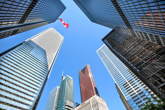 Toronto financial core banking buildings with Canadian flag