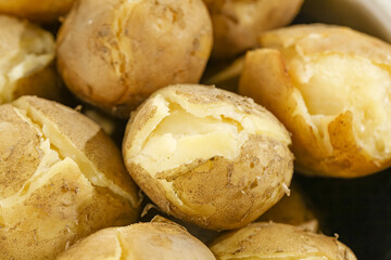 Hot Cooked Potatoes with Fluffy White Interior and Golden Skin