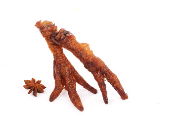 Marinated Chicken Feet Claw Snacks with Star Anise on White Background - Asian Food Delicacy