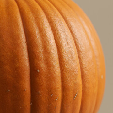 Close-up Texture of Pumpkin Skin, Macro close-up of a pumpkin&rsquo;s surface showing its natural orange texture and ridges under soft lighting. Perfect for autumn, harvest, or Halloween themes.