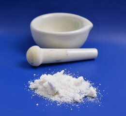 Alkylbenzene sulfonates powder on blue background