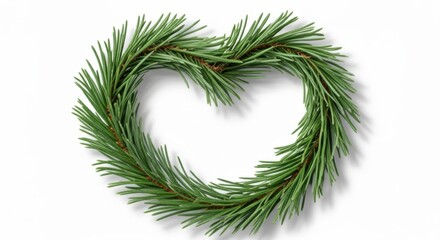 Heart shaped wreath made of fresh green pine needles on a white background