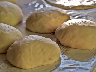Raw yeast dough rising - Homemade bread dough ready for baking