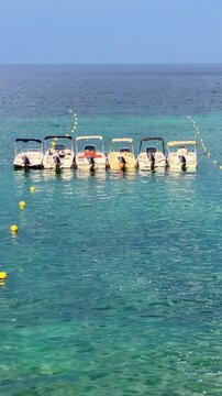 Paleokastritsa, Corfu Greece. 03.09.2025. Boats  for rent on the beach of Paleokastritsa .