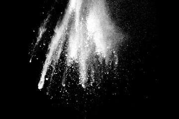 White powder explosion on black background.