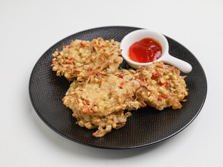 Vegetable fritters on white background