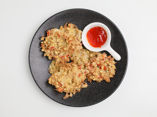 Vegetable fritters on white background