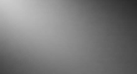Obraz premium A subtle light gradient effect with fine grain texture for creative backgrounds