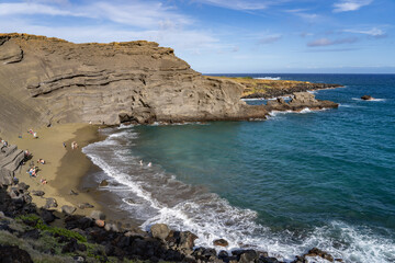 Papakōlea Beach (also known as Green Sand Beach or Mahana Beach[1]) is a green sand beach located near South Point, in the Kaʻū district of the island of Hawaiʻi. Olivine Crystals
