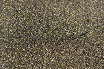 Close view of olivine-rich sand found on the beach. Papakōlea Beach (also known as Green Sand Beach or Mahana Beach is a green sand beach located near South Point, in the Kaʻū district of  Big island
