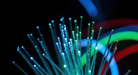 Fiber Optic Cables Glowing with Vibrant Colors Against Black Backdrop