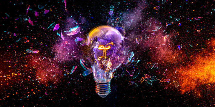 Light bulb exploding creating colorful abstract concept
