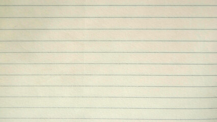 An old paper background. Vintage lined yellow paper texture.