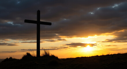 Silhouette of Christian cross on hill at sunset. Dramatic sky with golden light representing faith and hope. Religious and spiritual concept