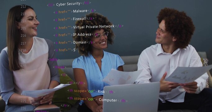 Colleagues discussing cybersecurity reviewing printed charts on laptop in office, with HTML overlay - Powered by Adobe