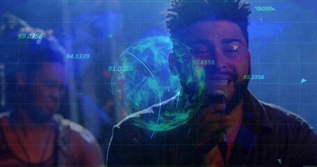 Singing vocalist holding mic on concert stage under blue lights with digital globe and numeric data