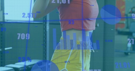 Displaying athlete wearing red workout gear tracking data on torso in gym, with squat rack, charts
