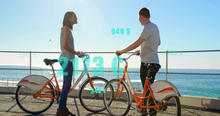 Standing couple chatting on seaside promenade, with rental bicycles and augmented reality overlays