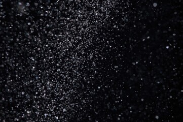 Obraz premium Captivating dispersion of luminous particles against an ethereal space illustration