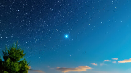 Stunning night sky filled with countless stars, showcasing bright celestial object shining prominently against deep blue backdrop. scene evokes