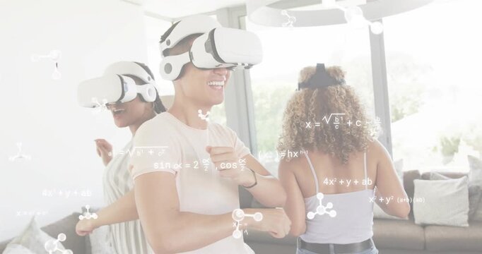 Three friends placing VR headsets in living room, exploring molecular simulation showing formulas