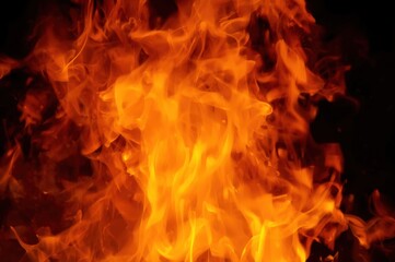 Fototapeta premium Fiery Inferno, Mesmerizing Display of Flames Dancing in the Darkness with Intense Heat