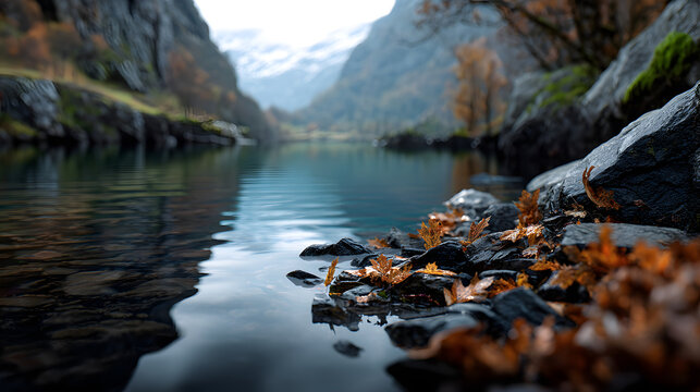 Quiet autumn scene with rustling leaves and calm waters under mountain cliffs.
