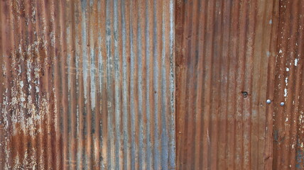 Old zinc surface background. Rusty metal texture. Weathered galvanize texture. Wavy rusty zinc...