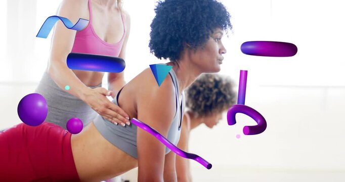 Fitness instructor placing hands at student's back, guiding bench backbend for posture alignment