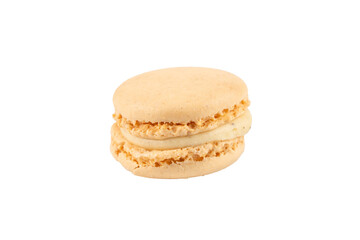 Single beige macaron close-up. A beige macaron with cream filling shown close-up. Its crunchy texture is visible. Macaron on a transparent background.