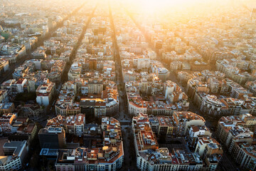 High angle overhead view of residential buildings in Barcelona, Spain at sunset