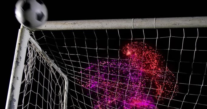 Dust cloud emerging inside net, forming goalkeeper and intercepting incoming soccer ball for sports