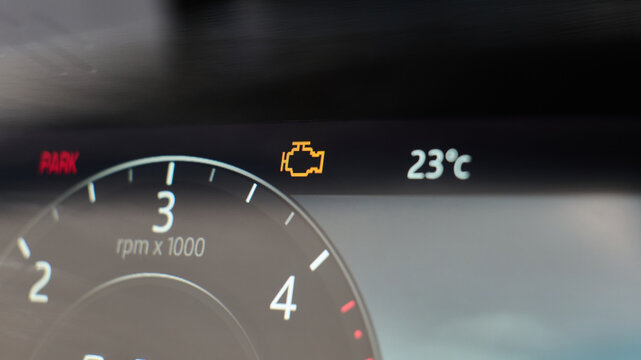 Dashboard shows check engine and temp readings